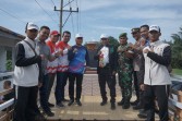 Asisten Perekonomian dan Pembangunan Sambut Kirab Api PON XXI Aceh - Sumut